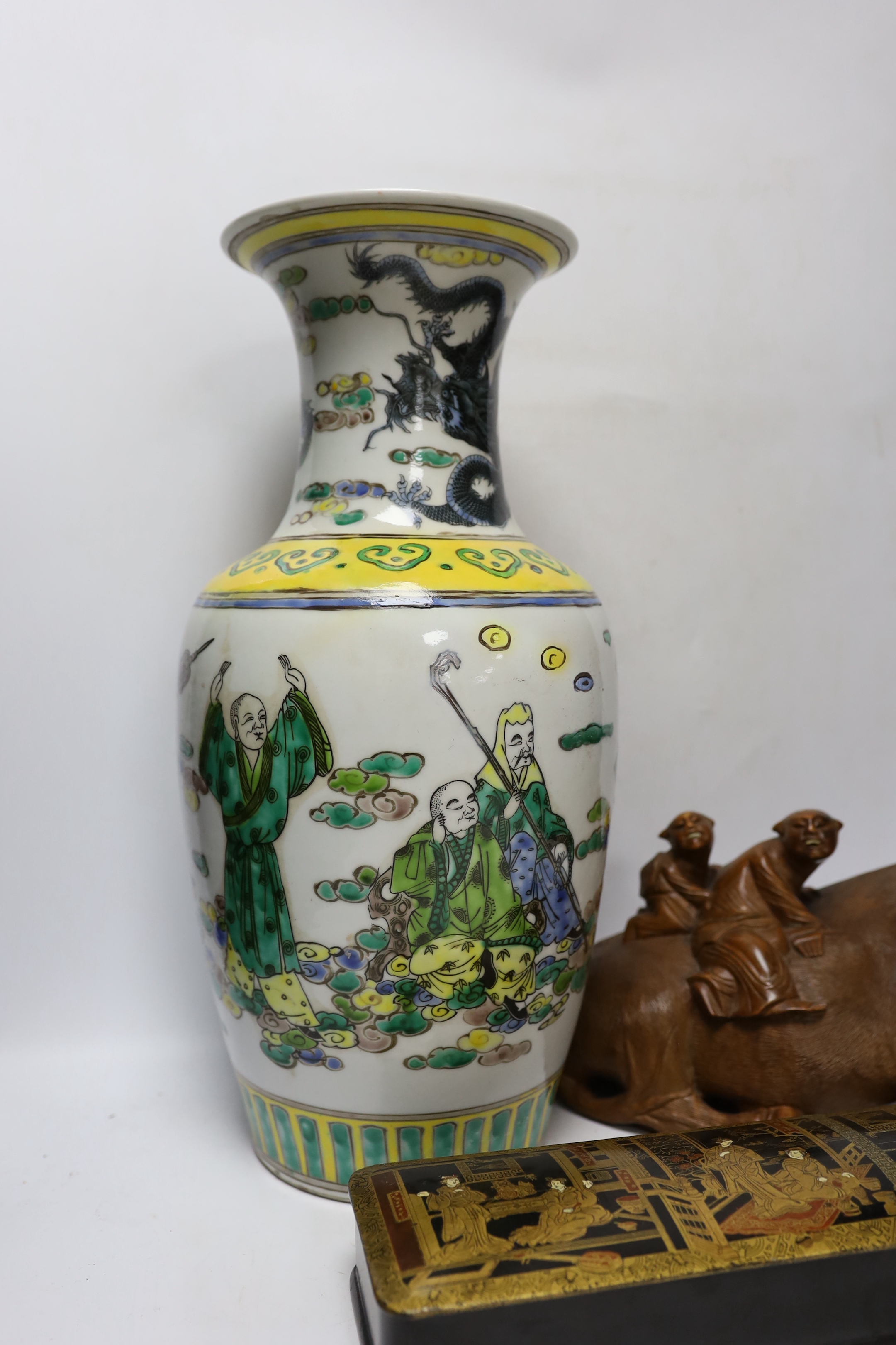 A Chinese famille verte vase, a papier-mâché box and a Chinese hardwood carving of an ox, tallest 42cm
